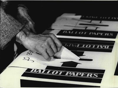 Federal Liberal Leader Mr John Howard votes on election day in his home seat of Bennalong on Sydneys North Shore.Howard votes at pooling booth in home seat of Bennalong yesterday (Sat).